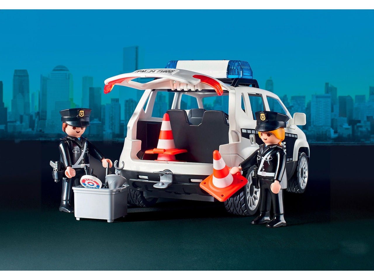 Playmobil Centrale della Polizia, edizione esclusiva per il 50° anniversario, con funzioni interattive, celle di fuga e piattaforma per elicotteri, giocattolo per bambini dai 4 anni in su | Playmobil