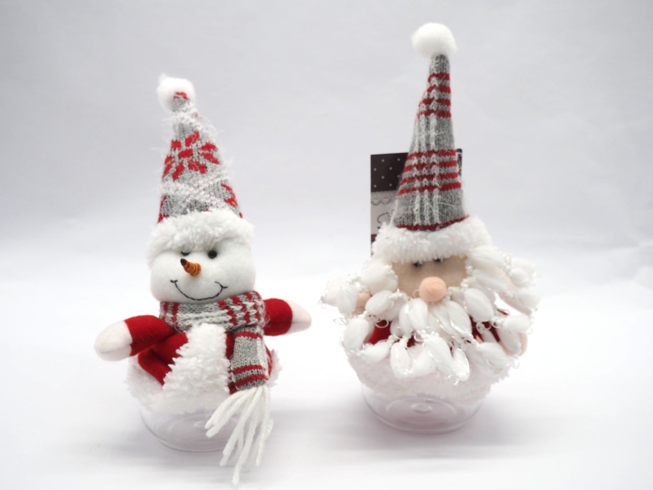 Babbo natale con contenitore in plastica 13xh.24cm 2modelli assortiti