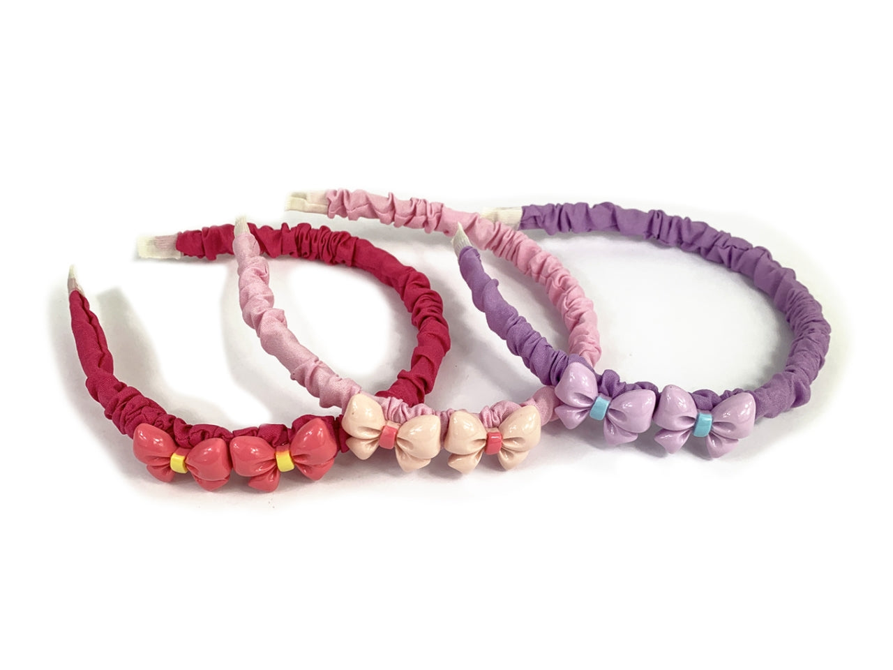 Cerchietto tessuto con fiocchi pvc