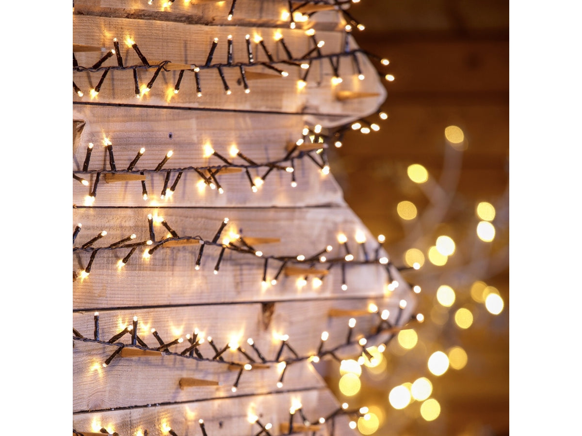 Catena 1500led bianco caldo con 8 giochi di luce, filo 4+30,5mt per alberi h.240-300cm