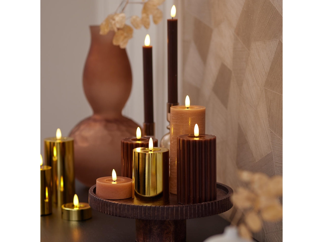Candela con stoppino e led d.7x12,5cm a batteria oro