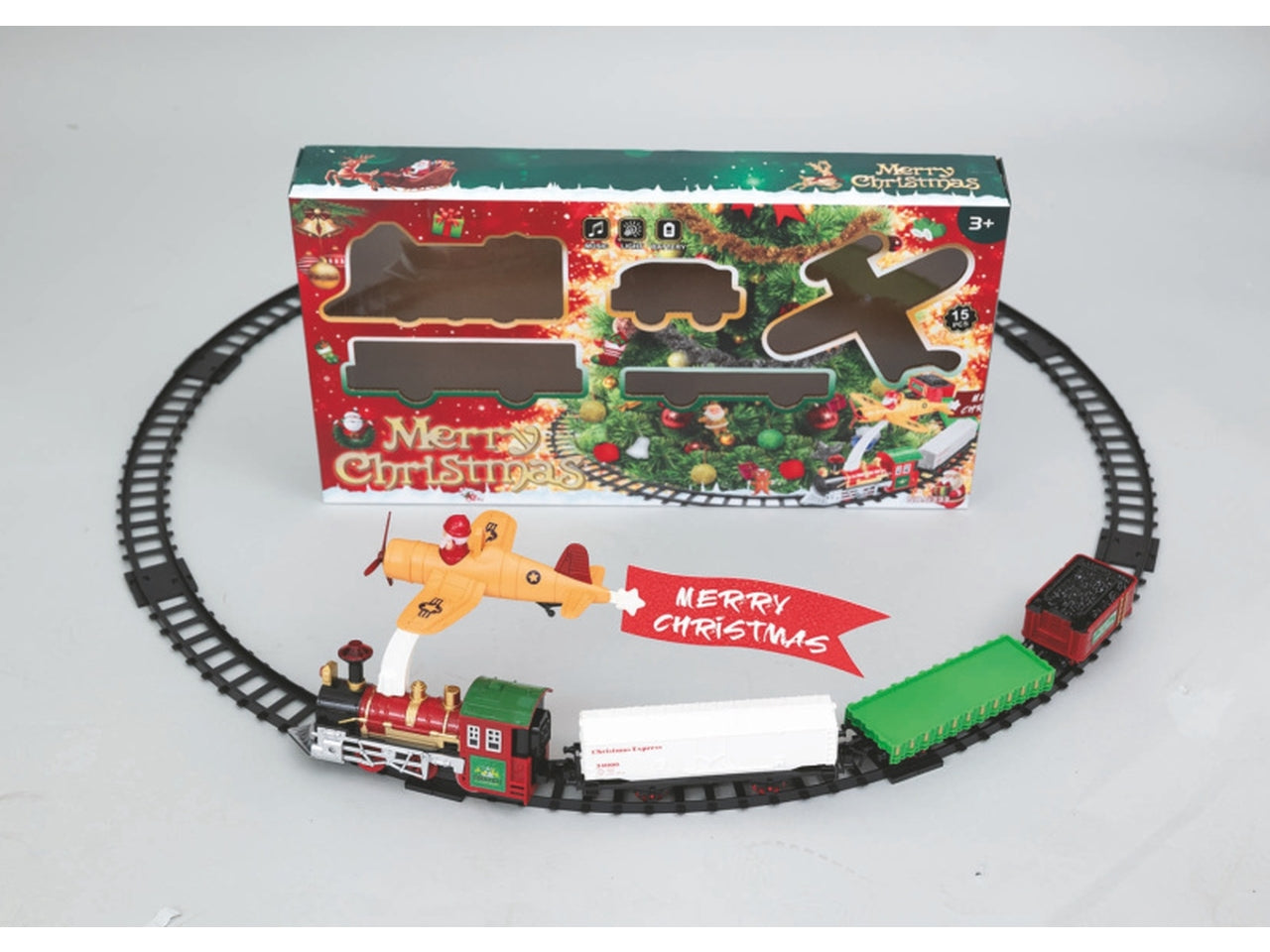 Trenino luminoso con musica babbo natale e aereoplano a batteria 2xaa