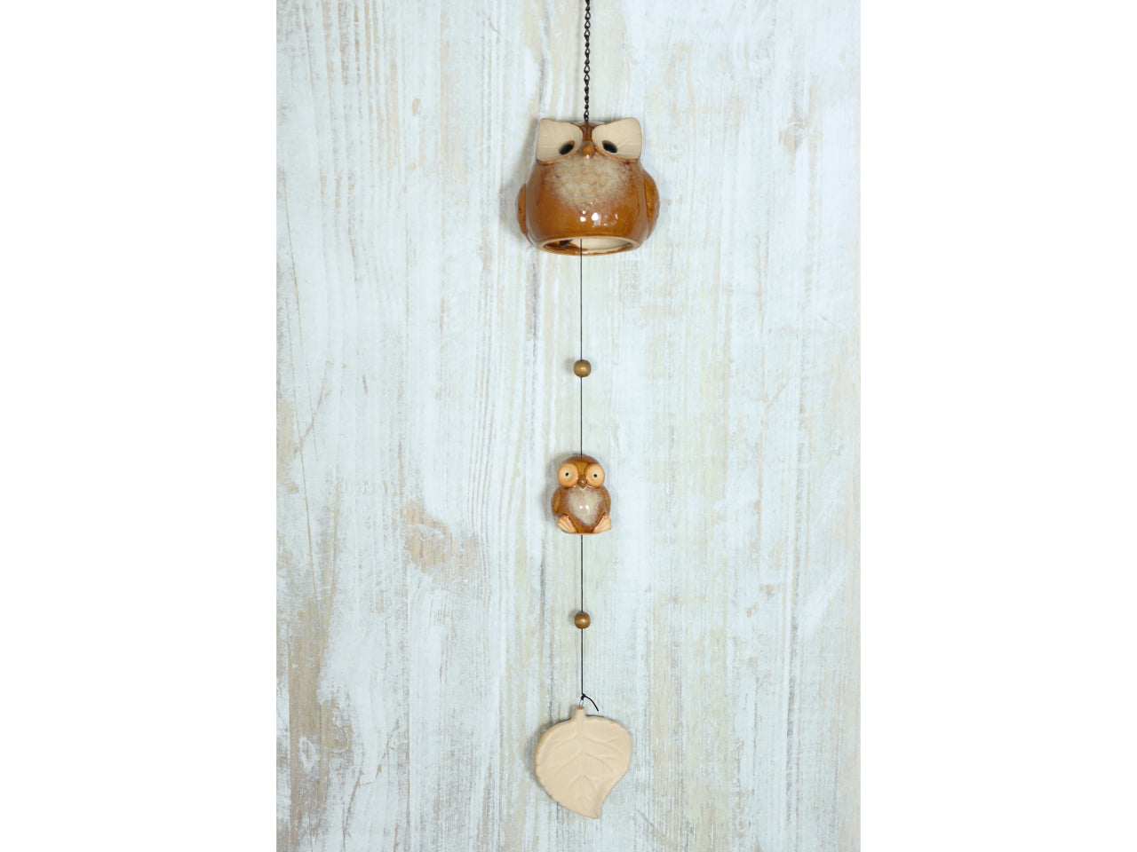 Gufo in gres con foglia d.10x70cm bianco