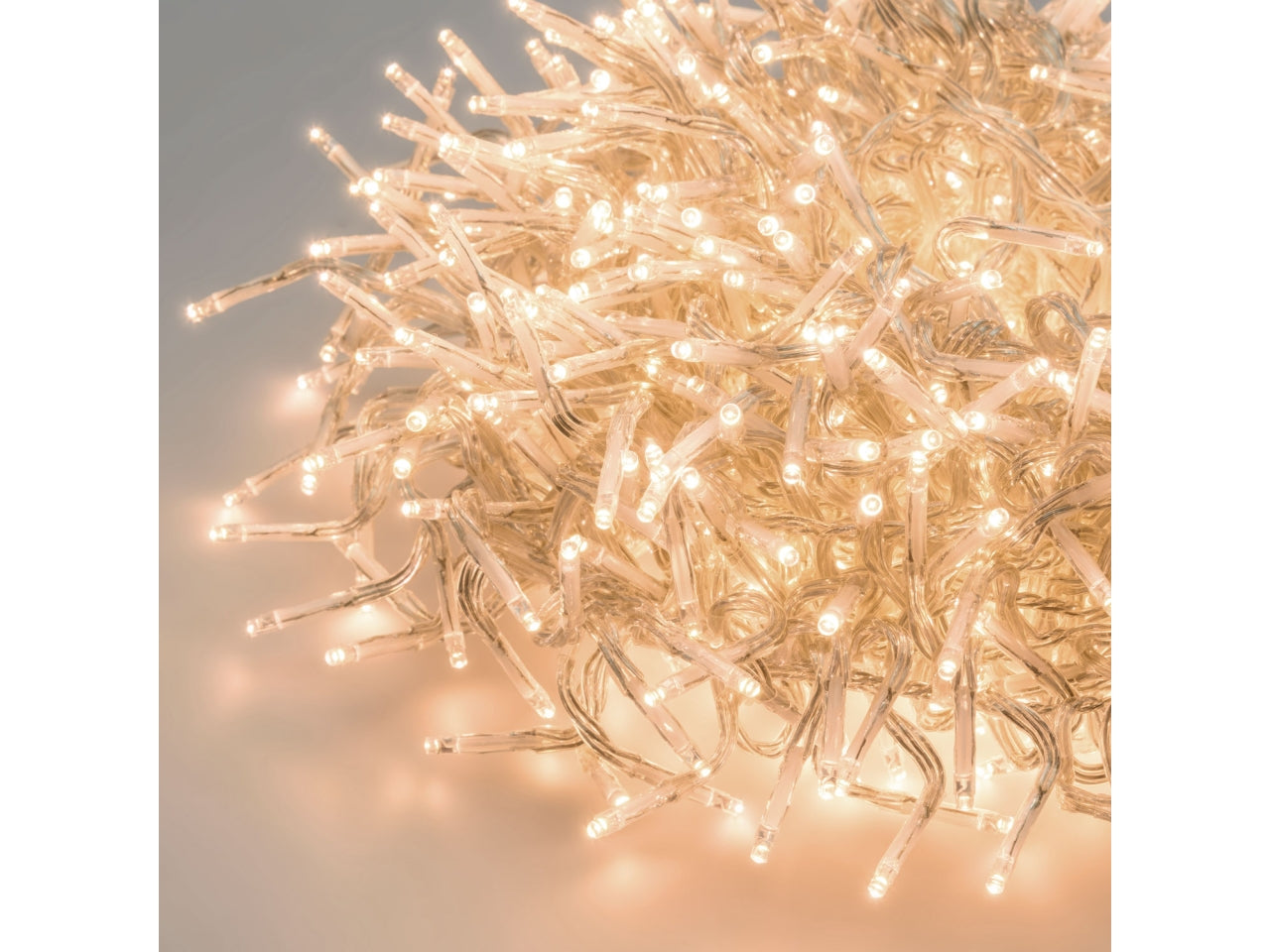 Catena cluster 1500 mini led bianco caldo luce fissa con filo trasparente 15+4mt per alberi da 180-300cm, uso interno ed esterno